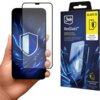 Na zdjęciu widoczny jest telefon z nałożonym szkłem hartowanym oraz opakowanie produktu 3mk RexGlass. Na opakowaniu znajduje się tekst: "Designed in Europe. Made for every screen. One glass. Multiple models. Perfect fit." oraz logo 3mk.
