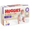 Opakowanie pieluchomajtek HUGGIES Extra Care Pants 6 (30 szt.) z widocznym logo HUGGIES w czerwonym kolorze oraz grafiką dziecka w pieluchomajtkach. Na opakowaniu znajdują się informacje: "extra care", "pants", "4 in 1 skin care", "15-25 kg", oraz liczba "30".