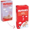 Na zdjęciu znajdują się dwa opakowania pieluszek HUGGIES. Po lewej stronie widoczne jest opakowanie "HUGGIES ultra comfort", a po prawej "HUGGIES Little Movers" z oznaczeniem rozmiaru 3 dla dzieci o wadze 4-9 kg.