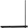 Laptop z otwartym ekranem, widoczny z boku, ukazujący porty na krawędzi obudowy. Na obudowie znajdują się porty USB, gniazdo audio oraz przycisk z czerwoną kropką.