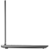 Laptop w kolorze szarym, widoczny z boku, z otwartą pokrywą ekranu. Urządzenie ma smukły profil i minimalistyczny design.