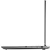 Na zdjęciu widoczny jest bok otwartego laptopa w kolorze srebrnym, z kilkoma portami, w tym USB i gniazdem audio. Laptop jest ustawiony w pozycji pionowej, a ekran jest otwarty pod kątem prostym.