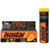 Opakowanie produktu "Izotonik ISOSTAR Hydrate & Perform Power Pomarańczowy (10 tabletek)" z widocznym napisem "HYDRATE & PERFORM POWERTABS" oraz grafiką pomarańczy. Na opakowaniu znajdują się informacje o izotonicznej formule, elektrolitach i węglowodanach, a także o naturalnym aromacie.