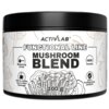 Opakowanie suplementu diety ACTIVLAB Blend Mushroom o pojemności 100 g, z widocznymi napisami: "FUNCTIONAL LINE", "MUSHROOM BLEND", "Measuring scoop", "Add to coffee, tea or other beverage", "VEGE Friendly", "100% Fruiting body extracts". Tło zdobią ilustracje grzybów.