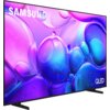 Telewizor z cienką ramką wyświetla kolorową grafikę z fioletowymi i niebieskimi bąbelkami. Na ekranie widoczne są napisy "SAMSUNG" i "QLED".