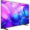 Na zdjęciu widoczny jest telewizor z wyświetlaczem prezentującym kolorowe, abstrakcyjne wzory w odcieniach fioletu, różu i niebieskiego. Telewizor ma cienką ramkę i stoi na dwóch prostych nóżkach.