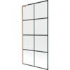 Szklany parawan nawannowy z czarną kratką i ramą w kolorze miedzi szczotkowanej, składający się z jednego skrzydła. Produkt ma wymiary 90 x 150 cm.
