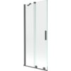 Dwuskrzydłowy, rozsuwany parawan nawannowy o wymiarach 80 x 150 cm, wykonany z przezroczystego szkła z elementami w kolorze gun gray szczotkowanym. Produkt ma prostokątny uchwyt i metalowe elementy montażowe.