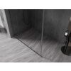 Przesłane zdjęcie przedstawia nowoczesną ściankę prysznicową typu walk-in z metalową ramką w kolorze gun metal, zamontowaną na podłodze z szarych płytek o marmurowym wzorze. Ściana prysznicowa jest przezroczysta, a w tle widoczne są ciemne płytki ułożone w jodełkę oraz czarny uchwyt prysznicowy.