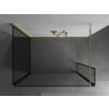Czarno-złota ścianka prysznicowa typu walk-in o wymiarach 130 x 80 x 30 cm, z widoczną złotą ramką i elementami montażowymi, umieszczona na tle szarej, betonowej ściany. Na suficie znajduje się złoty uchwyt z przymocowanym wężem prysznicowym.