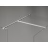 Na zdjęciu widoczna jest ścianka prysznicowa Walk-in o wymiarach 140 x 120 cm, wykonana z przezroczystego szkła o grubości 10 mm, z elementami w kolorze niklu szczotkowanego. Konstrukcja składa się z dwóch szklanych paneli połączonych metalowymi wspornikami.