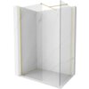 Przedstawiono ściankę prysznicową typu walk-in o wymiarach 160 x 110 cm, wykonaną z przezroczystego szkła o grubości 10 mm, z elementami w kolorze złotym szczotkowanym. Ścianka jest umieszczona w narożniku z marmurowymi ścianami.