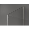 Przezroczysta ścianka prysznicowa z niklowanym, szczotkowanym wykończeniem, z widocznym logo "MEXEN" na metalowej ramie. Produkt ma minimalistyczny design i jest przedstawiony na szarym tle.