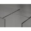 Na zdjęciu znajduje się ścianka prysznicowa typu walk-in z metalową ramką w kolorze gun metal. Produkt jest przezroczysty i ma wymiary 110 x 75 cm.