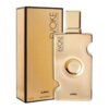 Złoty flakon perfum o nowoczesnym kształcie z napisem "EVOKE GOLD EDITION" oraz "AJMAL" stoi obok pudełka w podobnym kolorze, na którym widnieje ten sam napis. Na dole flakonu i pudełka znajduje się tekst "75 ml" oraz "EAU DE PARFUM".
