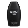 Czarny flakon perfum z białym napisem "DRAKKAR NOIR" oraz mniejszym tekstem "EAU DE TOILETTE VAPORISATEUR - NATURAL SPRAY" i "Guy Laroche PARIS".