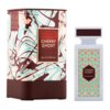 Opakowanie i flakon perfum "Flavia Cherry Ghost" o pojemności 90 ml, z kolorowym, abstrakcyjnym wzorem na opakowaniu i geometrycznym wzorem na flakonie. Na obu widnieje napis "CHERRY GHOST EAU DE PARFUM".