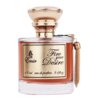 Flakon perfum o złotym korku i etykiecie z napisem: "Emir Fire your Desire 100 ml eau de parfum 3.4 fl. oz". Po boku flakonu wisi złoty chwost.