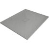 Szary, prostokątny brodzik o teksturowanej powierzchni z centralnie umieszczonym odpływem w kształcie prostokąta. Produkt ma wymiary 130 x 100 cm.