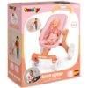 Pudełko z wózkiem dla lalek marki Smoby, model Baby Nurse, z widocznym wózkiem w kolorze różowym i pomarańczowym oraz lalką w środku. Na opakowaniu znajdują się napisy: "Smoby", "Baby Nurse", "Metal", "+18m", oraz zdjęcia przedstawiające dziecko bawiące się wózkiem.