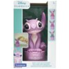 Fioletowa lampka nocna w kształcie postaci z bajki, z dużymi oczami i uszami, znajduje się w opakowaniu z napisem "Disney Classics" oraz "Lilo & Stitch". Na opakowaniu widoczne są również zdjęcia produktu w różnych kolorach oraz logo "Lexibook".