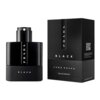 Czarne opakowanie i flakon perfum z białym napisem "PRADA BLACK" oraz "LUNA ROSSA" na obu elementach. Na opakowaniu widoczny jest również napis "EAU DE PARFUM" oraz pojemność "50 ml / 1.6 FL. OZ.".