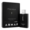 Czarne opakowanie i flakon perfum z napisem "Precieux I club de nuit Extrait De Parfum" oraz logo "ARMAF". Na flakonie wisi srebrny łańcuszek z napisem "Club De Nuit".