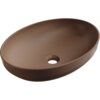 Brązowa, matowa umywalka nablatowa o owalnym kształcie z otworem odpływowym na dnie. Na wewnętrznej powierzchni widoczne jest logo "MEXEN".