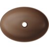 Brązowa, matowa umywalka nablatowa o owalnym kształcie z centralnym otworem odpływowym. Na krawędzi widoczne jest logo "MEXEN".