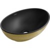 Czarna matowa umywalka nablatowa o owalnym kształcie z zewnętrzną powierzchnią w złoty wzór przypominający łuski. Na wewnętrznej stronie umywalki widoczne jest logo "Mexen".