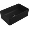 Czarna, matowa umywalka nablatowa o prostokątnym kształcie z zaokrąglonymi krawędziami i otworem odpływowym na dnie. Produkt ma gładką powierzchnię i minimalistyczny design.