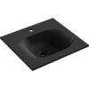 Czarna matowa umywalka wpuszczana w blat o wymiarach 51 x 46,5 cm z otworem na baterię i otworem odpływowym. W lewym górnym rogu widoczny jest napis "MEXEN".