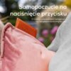 Różowa poduszka elektryczna z widocznym brązowym panelem sterującym z logo "beurer" i symbolem włącznika. Na zdjęciu znajduje się tekst: "Samopoczucie na naciśnięcie przycisku. Z trzema ustawieniami temperatury i lampkami kontrolnymi LED."