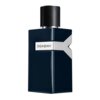 Ciemnoniebieska butelka perfum o prostokątnym kształcie z czarnym, teksturowanym korkiem, ozdobiona srebrnym elementem w kształcie litery "Y" z napisem "Yves Saint Laurent".