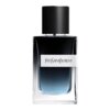 Przedstawiono flakon perfum o prostokątnym kształcie z ciemnym, gradientowym szkłem, zakończony czarnym, teksturowanym korkiem. Na butelce widnieje napis "Yves Saint Laurent".