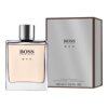 Przedstawiono flakon wody toaletowej z napisem "BOSS MAN" oraz pudełko z tym samym napisem. Na pudełku widnieje tekst: "Eau de Toilette Natural Spray Vaporisateur 100 ml e 3.6 FL. OZ.".