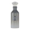 Butelka perfum o gradientowym szarym kolorze z przezroczystym korkiem, na której widnieje etykieta z napisem "VELVET MUSK" oraz tekstem w języku arabskim.