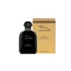 Czarno-złota butelka perfum z napisem "JAGUAR FOR MEN GOLD IN BLACK" stoi obok złotego pudełka z tym samym napisem. Na pudełku widoczne jest logo przedstawiające sylwetkę jaguara.