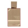 Prostokątna butelka perfum w złotym kolorze z napisem "HARAMAIN AMBER OUD" oraz "ROUGE" na dole. Kształt korka jest prostokątny, a powierzchnia butelki ma delikatną, pionową fakturę.