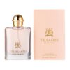 Flakon perfum o różowym odcieniu z złotym korkiem, obok znajduje się różowe pudełko z logo i napisem "Trussardi Delicate Rose". Na pudełku widnieje również tekst "Eau de Toilette Natural Spray Vaporisateur e 50 ml 1.7 fl. oz. U.S.".