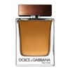 Prostokątna butelka z przezroczystego szkła wypełniona bursztynowym płynem, z ciemnobrązowym korkiem. Na dole butelki widnieje napis "DOLCE & GABBANA the one".