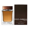 Na zdjęciu widoczna jest butelka perfum z brązowym korkiem oraz brązowe opakowanie z napisem "Dolce & Gabbana the one". Na opakowaniu znajduje się tekst: "FOR MEN EAU DE TOILETTE NATURAL SPRAY VAPORISATEUR 150 ml e 5.0 FL. OZ.".