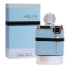 Na zdjęciu widoczna jest niebieska butelka perfum z metalicznym korkiem oraz opakowanie z napisem "Blue HOMME Eau de Parfum". Na butelce znajduje się okrągłe logo z napisem "ARMAF".