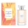 Na zdjęciu widoczna jest butelka perfum oraz pudełko z napisem "LES FLEURS DE LANVIN PARIS Sunny Magnolia". Na dole pudełka znajduje się tekst "EAU DE TOILETTE VAPORISATEUR - NATURAL SPRAY 90 ml e 3 FL.OZ".