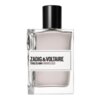Na zdjęciu znajduje się flakon perfum marki Zadig & Voltaire z napisem "This is Him! Undressed". Butelka ma prosty, elegancki design z czarnym korkiem.