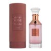 Brązowe opakowanie i szklana butelka perfum z różowym płynem, obie z etykietą "Velvet Rose" oraz napisami w języku arabskim. Na opakowaniu widnieje również logo "Lattafa".