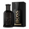 Czarne opakowanie i butelka perfum z napisem "BOSS HUGO BOSS BOTTLED PARFUM" oraz informacją "100 ml e 3.3 FL. OZ." na dole. Butelka ma elegancki, ciemny design z wytłoczonym napisem "BOSS".