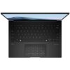 Czarny laptop z widoczną klawiaturą QWERTY, touchpadem z funkcją numeryczną oraz logo "Dolby Vision" i "harman/kardon". Na ekranie wyświetla się napis "ASUS Zenbook".