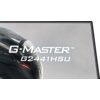 Na zdjęciu widoczny jest fragment monitora z napisem "G-Master G2441HSU" na tle szarej powierzchni. W lewym dolnym rogu znajduje się część ciemnego obiektu przypominającego hełm.