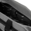 Czarna torba kabinowa z poliestru o pojemności 20 litrów, z widocznym wnętrzem wyłożonym materiałem z powtarzającym się logo "WINGS". Torba posiada zamek błyskawiczny oraz uchwyt do przenoszenia.